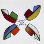 Four Satin Glass Feathers with multiple colours scanned for cataloging.